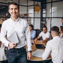 Group of people working out business plan in an office